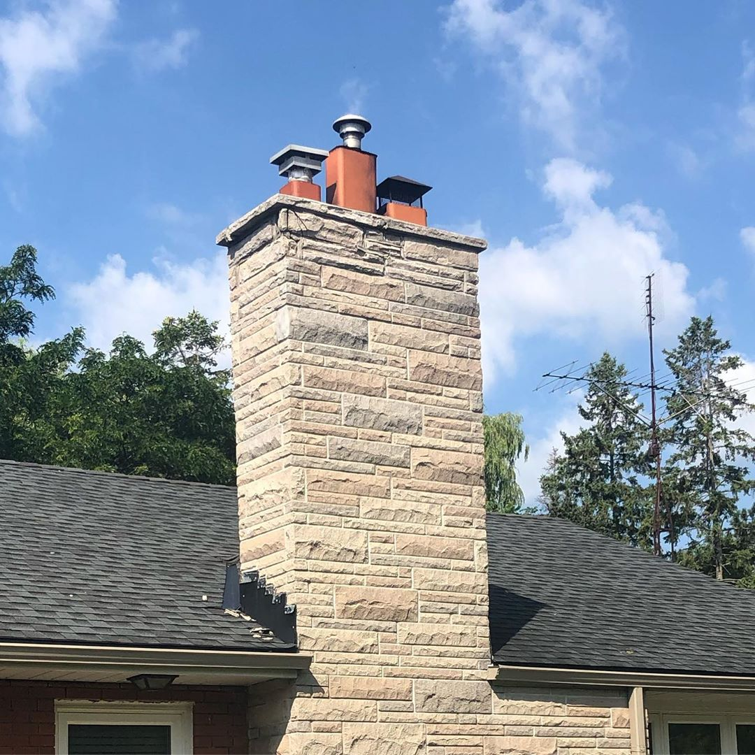 Close view of professional chimney masonry work